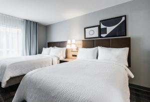 Postel nebo postele na pokoji v ubytování Staybridge Suites - Dawson Creek by IHG