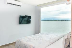 TV a/nebo společenská místnost v ubytování Hotel Caribbean Cartagena