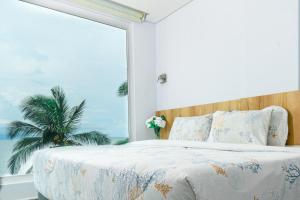 Postel nebo postele na pokoji v ubytování Hotel Caribbean Cartagena
