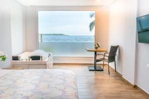 Postel nebo postele na pokoji v ubytování Hotel Caribbean Cartagena + 37 fotografií