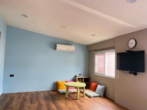 TV o dispositivi per l'intrattenimento presso Xin Yuan Hang Homestay