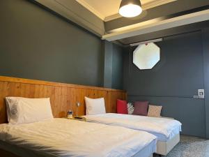 Letto o letti in una camera di Xin Yuan Hang Homestay
