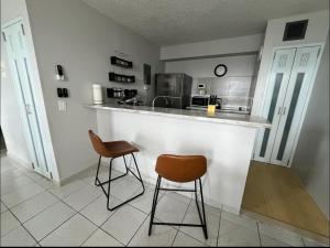 Kuchyň nebo kuchyňský kout v ubytování Oceanfront in Luquillo