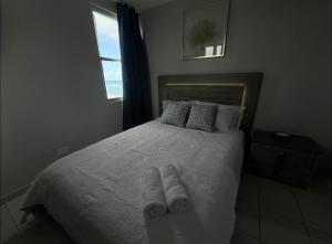 Postel nebo postele na pokoji v ubytování Oceanfront in Luquillo