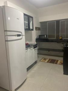 Kuchyň nebo kuchyňský kout v ubytování LM Home 2 - Casa com 3 Quartos
