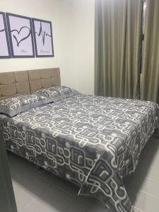 Katil atau katil-katil dalam bilik di LM Home 2 - Casa com 3 Quartos
