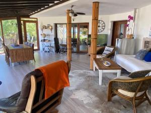 a living room with a couch and a table at Villa Draganovi in Kamen Bryag