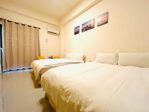 Postel nebo postele na pokoji v ubytování Monkey Travel B&B