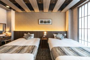Letto o letti in una camera di 谷町君Hotel Crush On 京都四条烏丸