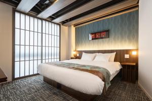 Letto o letti in una camera di 谷町君Hotel Crush On 京都四条烏丸