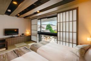 Letto o letti in una camera di 谷町君Hotel Crush On 京都四条烏丸