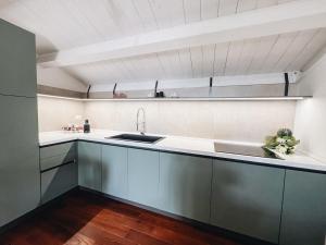 Kuchyň nebo kuchyňský kout v ubytování Galé Suite Apartment + 21 fotografií