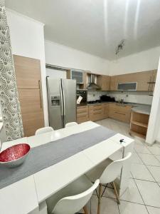 Η κουζίνα ή μικρή κουζίνα στο Big Family Apartment