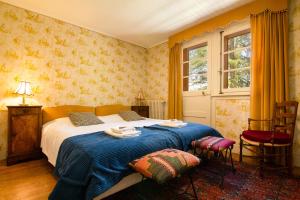 Ένα ή περισσότερα κρεβάτια σε δωμάτιο στο Chalet Ecureuil - Happy Rentals