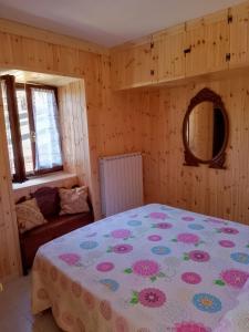 Letto o letti in una camera di La Casa dei Nonni