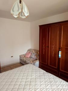 Letto o letti in una camera di La Casa dei Nonni