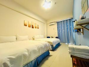 Postel nebo postele na pokoji v ubytování Monkey Travel B&B