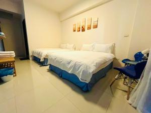 Postel nebo postele na pokoji v ubytování Monkey Travel B&B