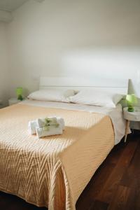 Postel nebo postele na pokoji v ubytování Galé Suite Apartment
