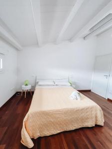 Postel nebo postele na pokoji v ubytování Galé Suite Apartment