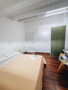 Postel nebo postele na pokoji v ubytování Galé Suite Apartment