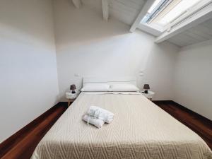 Postel nebo postele na pokoji v ubytování Galé Suite Apartment