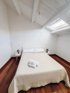 Postel nebo postele na pokoji v ubytování Galé Suite Apartment