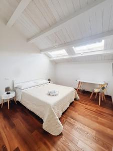 Postel nebo postele na pokoji v ubytování Galé Suite Apartment