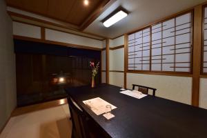 Krevet ili kreveti u jedinici u okviru objekta 戸倉上山田温泉玉の湯