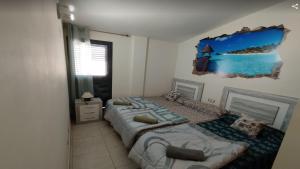 Posteľ alebo postele v izbe v ubytovaní Espectacular Chalet Adosado de lujo "Bienvenido al Paraíso"