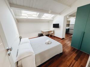 Postel nebo postele na pokoji v ubytování Galé Suite Apartment