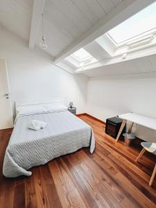 Postel nebo postele na pokoji v ubytování Galé Suite Apartment
