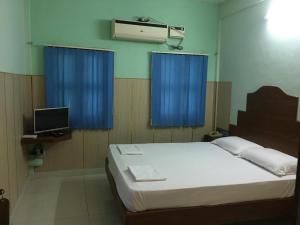 Postel nebo postele na pokoji v ubytování VALLI HOTEL