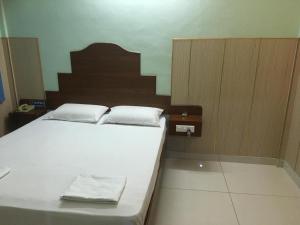 Postel nebo postele na pokoji v ubytování VALLI HOTEL