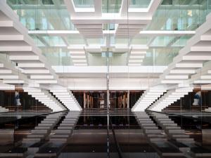 a view of a building with a glass ceiling at ISEYA Panoramic Hotel Chongqing Jiefangbei Raffles Plaza in Chongqing
