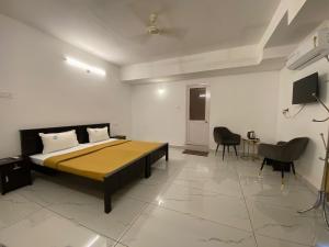 Katil atau katil-katil dalam bilik di Avanthi Homestay