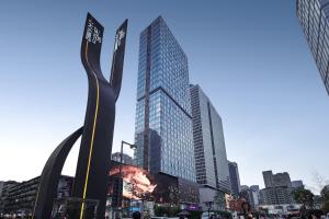 a view of a city with a tall skyscraper at ISEYA Serviced Apart-ment Chengdu Taikoo Li Flagship in Chengdu