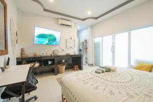 Billede fra billedgalleriet på Sunset beach apartment 12 O3 villas i Koh Phangan