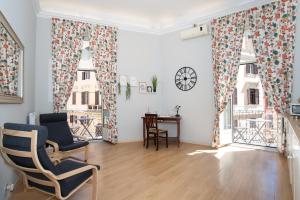 Posezení v ubytování GuestHouse o Affittacamere Magenta Baylon Suite