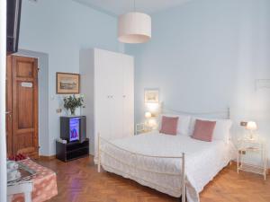 A bed or beds in a room at Affittacamere Firenze in Libertà Parterre