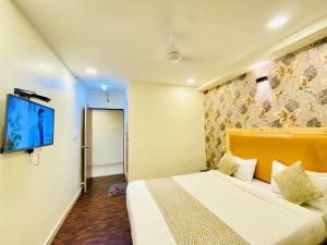 Postel nebo postele na pokoji v ubytování Hotel Alexa - Satellite Prahladnagar, Ahmedabad