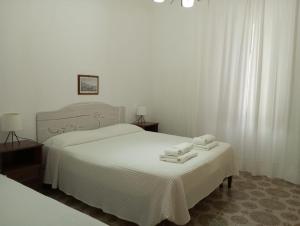 Postel nebo postele na pokoji v ubytování Casa Bettina