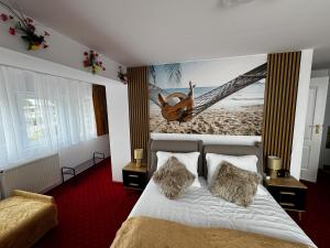 Postel nebo postele na pokoji v ubytování BUTIK Hotel 350m od plaży