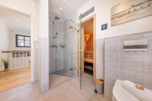 Koupelna v ubytování Ferienhaus Strandkajüte + 37 fotografií