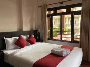 Uma cama ou camas num quarto em Hotel Nevis