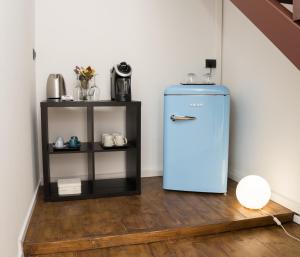 Kuchyň nebo kuchyňský kout v ubytování Four Rooms