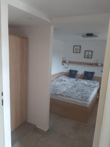 Postel nebo postele na pokoji v ubytování Apartmán LUKA 2
