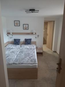 Postel nebo postele na pokoji v ubytování Apartmán LUKA 2
