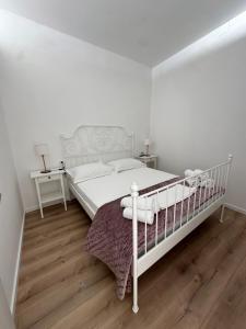 Postel nebo postele na pokoji v ubytování Apartments Alać