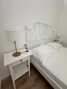 Postel nebo postele na pokoji v ubytování Apartments Alać